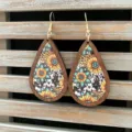 Close-up detail of western vintage wooden teardrop earrings with sunflower and aztec prints. - Sunflower Ethnic Style (7)