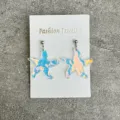 Detailed view of holographic starfish acrylic earrings showing sparkling texture on display card. - Starfish Style (10230146)