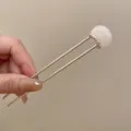 Detailed view of the elegant Chinese style U-shaped hair fork with white marbled top. - 12.5cm / Milk White(12.5cm)