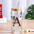 Glass can cup with bamboo lid and straw, clear borosilicate glass floral letter cold drink tumbler. - Style A