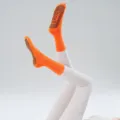 Orange pilates grip socks with non-slip dots for yoga and fitness workout routine. - One Size / Canna Orange