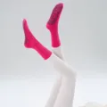 Solid color pink yoga socks with black grip dots on sole for professional fitness pilates workouts. - One Size / Plum Pink