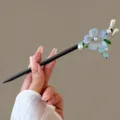 Detailed view of traditional Chinese wooden hairpin with blue floral and pearl tassel decor. - Peach Blossom Tassel Style / Blue (FZ25157)