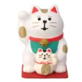 Detailed view of cute Japanese lucky cat resin ornament, mini desktop decor figure, fine craftsmanship. - White