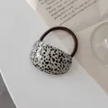 Minimalist black and white dalmatian pattern hair tie stylish geometric ponytail holder for women. - Spotted