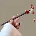 Exquisite Chinese style wooden hairpin detail, dark wood body, red rose and elegant tassel. - Fengyinfeihua Style (FZ25123)