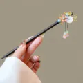 Traditional Chinese wooden hairpin with elegant floral metal tassel decor for elegant buns. - Xiaozuixianmian Style (FZ25118)