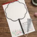 Chinese traditional blank round silk fan with black handle and silver tassel for painting. - Beechwood Eight-Petal Pattern - Navy Border