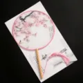 Traditional Chinese style round fan with wooden handle and pink tassel, elegant floral print. - New - Bird Singing Valley