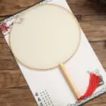 Traditional Chinese style blank round palace fan with wooden handle and red tassel for DIY painting. - Schima Wood - Vintage Satin