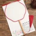 Traditional Chinese style round silk fan with wooden handle and red tassel for painting. - Beechwood Lantern Pattern - Red Border