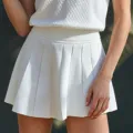 Femme jupe plissée en tricot blanc été respirant sport tennis golf vêtements de sport - S / Bas / Blanc