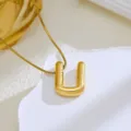 Gold U letter pendant necklace detail view showcasing elegant metal texture and fine chain. - Gold-Letter U
