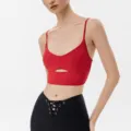 Red sports bra crop top with cutout design paired with black active leggings for yoga and gym fitness. - QS24381C-Red