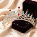 Gold crystal bridal tiara crown with red and blue rhinestones for wedding party detail view - KC Gold With Red And Blue Rhinestone