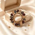 Exquise broche ronde en cristal vintage détail avec pierres multicolores en forme de goutte. - Style Larme Multicolore Ronde (款9)