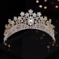 Close-up detail of luxury gold Baroque rhinestone bridal crown, sparkling crystal tiara. - Gold + White Rhinestone