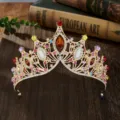 Close-up detail of luxury Baroque bridal crown, sparkling multi-color rhinestones alloy tiara. - Gold Colorful Zirconia