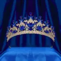 Luxurious gold blue rhinestone bridal tiara detail, sparkling wedding hair accessory crown. - Gold + Blue Rhinestone