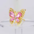 Exquisito alfiler decorativo de mariposa de cristal con piedras rosas y brillantes. - Oro con diamantes de imitación rosas
