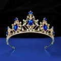 Exquisite bridal tiara detail, golden alloy crown with blue teardrop rhinestones for wedding. - Gold with Royal Blue