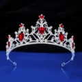 Close-up detail showcasing the sparkling silver tiara adorned with vibrant red rhinestones. - Silver with Red Rhinestone