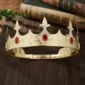Detail shot of a golden king crown with red gems, perfect for parties and events. - Gold Red Zirconia