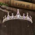 Detailed view of a gorgeous rose gold tiara with purple and clear rhinestones for girls. - Rose Gold + Purple Rhinestone