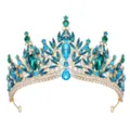 Close-up detail of a stunning gold tiara with sparkling blue and green crystal rhinestones. - Gold With Gradient Green Rhinestone