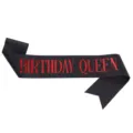 Black glitter birthday queen sash detail shot, sparkling fabric with red text for parties. - Black + Red Letter QUEEN Sash
