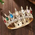 Close up detail of Baroque gold rhinestone crown with sparkling crystal and colorful teardrop gems. - KC Gold + Multicolor