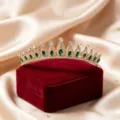Detailed view of a vintage European bridal rhinestone tiara crown with green and clear crystal. - KC Gold Green