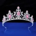Close-up detail of silver rhinestone princess tiara with pink crystals for wedding party. - Silver + Pink Rhinestone