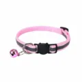 Detail view of reflective pink pet collar featuring cat-shaped buckle and bell - Pink