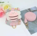 Detailed view of pink corduroy pet harness and leash set with a plush bee design - Pink