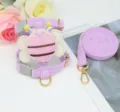 Close-up of purple corduroy pet harness with a cute plush bee decoration and leash - 1.2m M / Purple