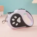 Laisse pour chien LED rétractable automatique avec motif de patte en violet et noir - 5M avec Lumière / Blanc