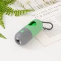 Distributeur de sacs à déjections canines vert avec lampe LED et mousqueton métal - Boîtier Vide / Distributeur à LED vert