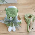 Green waffle-textured dog harness and leash set featuring a cute cartoon bear and bow - S / Green