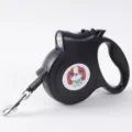 Black 5m retractable dog leash with integrated LED light and cute cartoon dog sticker - Black