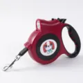 Dark red automatic retractable pet leash with LED flashlight and cute dog sticker - Red
