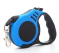Automatic retractable dog leash in blue and black with comfortable ergonomic handle - Bone Blue