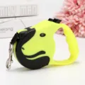 Retractable pet leash for small dogs featuring a neon bull terrier head design - Yellow Bagged Dog Head