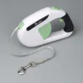 Automatic retractable dog leash with ergonomic handle and green accents for pet safety - 3 Meters / Retractable Leashes in White and Green