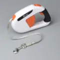 Retractable pet leash in white and orange with ergonomic handle - Retractable Leashes in White and Orange
