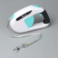 Automatic retractable dog leash with turquoise buttons and ergonomic black grip handle - Retractable Leashes in White and Blue