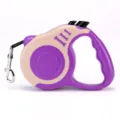 Retractable pet dog leash with ergonomic handle and bone-shaped patterns in purple and beige. - 5 Meters Card Packaging / Bone Beige Purple