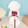 Festive red and black plaid pet harness with snowflake pattern and decorative bow tie - Snowflake H-Harness Pink [Long Leash Without Bow Tie]