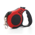 Red and black automatic retractable dog leash featuring a durable metal buckle for pets - Bone Red
