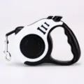 Retractable dog leash with automatic locking mechanism in stylish black and white - Bone White